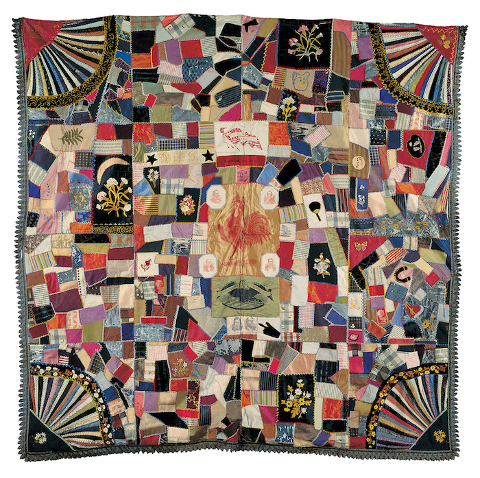 Artist unidentified; initialed “J.F.R.”  Cleveland-Hendricks Crazy Quilt, Cleveland-Hendricks Crazy Quilt, 1885-1890. Lithographed silk ribbons, silk, and wool with cotton fringe and silk and metallic embroidery, 75 x 77 in. American Folk Art Museum.