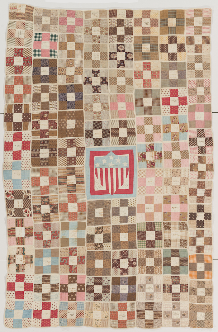 Nine Patch, Maker unknown (probably made in Detroit, MI), 1864. Hand and machine appliqued cotton, hand inked, 93 x 58 in. International Quilt Museum, 1997.007.0569. Image Credit: International Quilt Museum, University of Nebraska-Lincoln