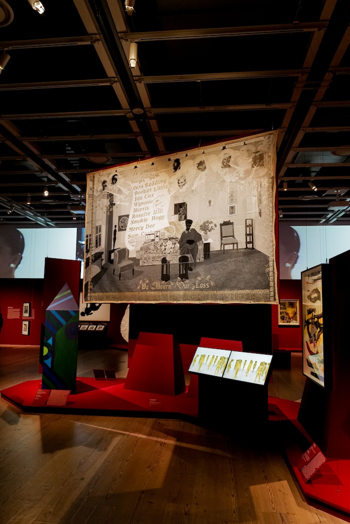 Installation view of Edges of Ailey (Whitney Museum of American Art, New York, September 25, 2024-February 9, 2025). From left to right: Ellsworth Ausby, Untitled, 1970; Kerry James Marshall, Souvenir IV, 1998; Lorna Simpson, Momentum, 2011. Photograph by Jason Lowrie/BFA.com. © BFA 2024