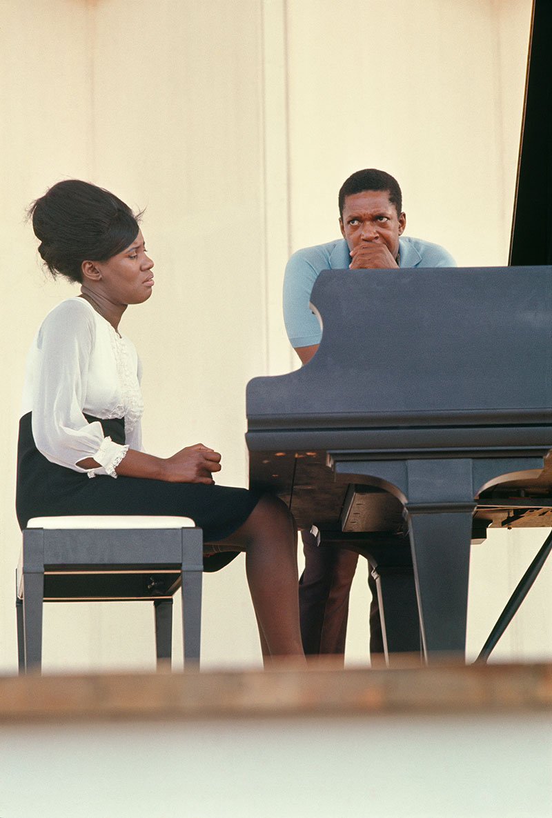 Alice and John Coltrane at the Newport Jazz Festival, 1966. Courtesy of Yasuhiro Fujioka collection. Photo: Hozumi Nakadaira